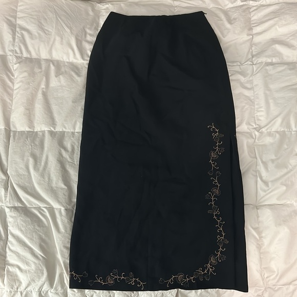 Black Maxi Skirt with Thigh Slit on side. Comes with Embroidered Flower Design. - Picture 1 of 4